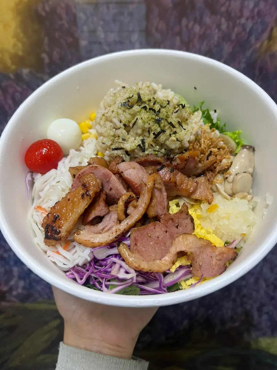 Mixed poke bowl with smoked duck and vegetables