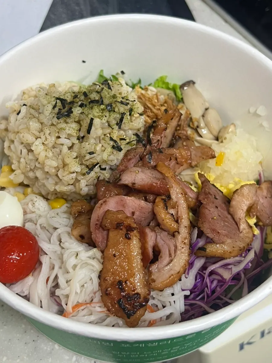 100g of brown rice topped with furikake