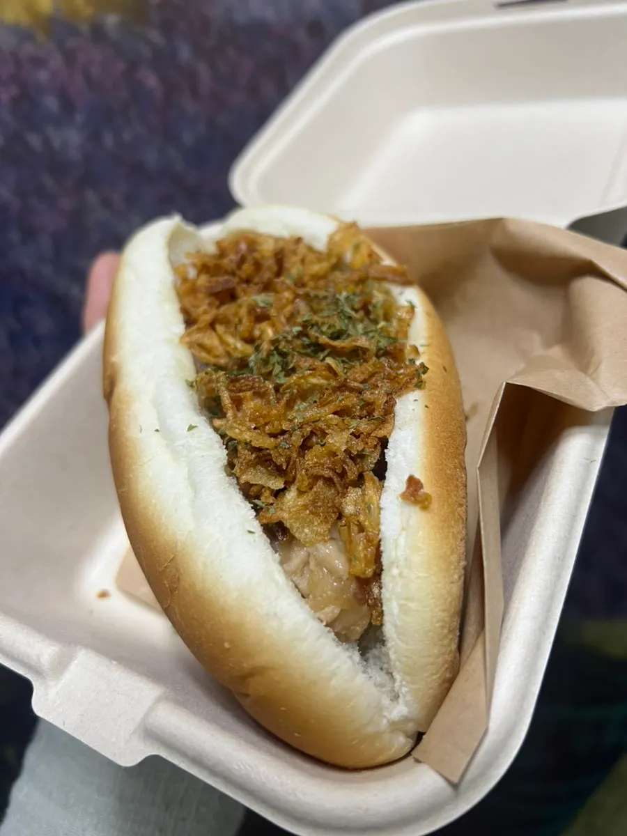 Cream chicken sandwich with onion flakes