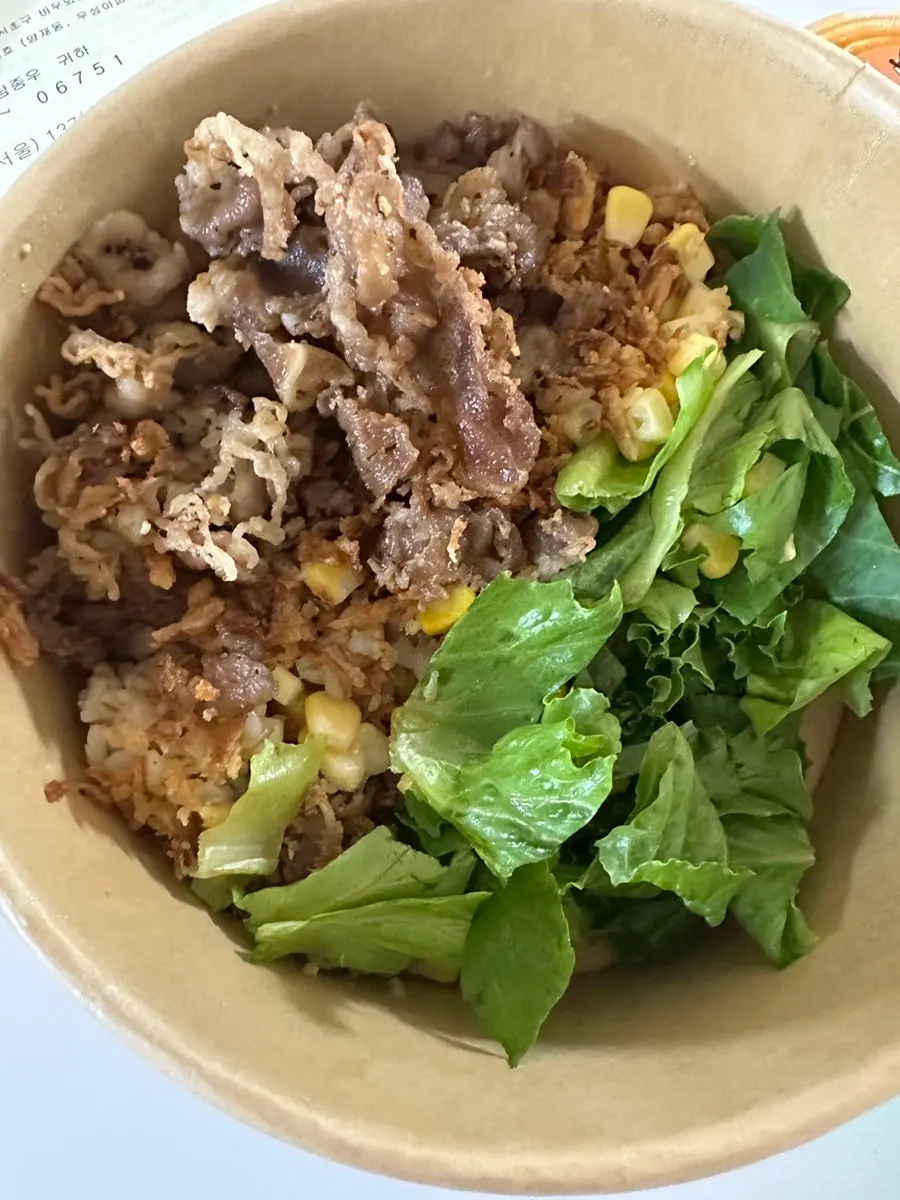 Beef brisket whole wheat pasta poke being mixed
