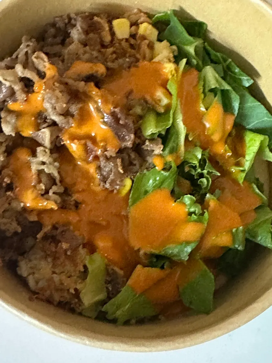 A spoonful scooped from the rice bowl