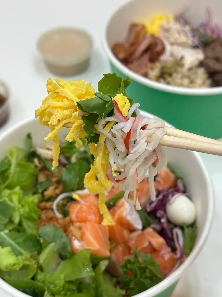 Poke container full of vegetables and toppings from Salering