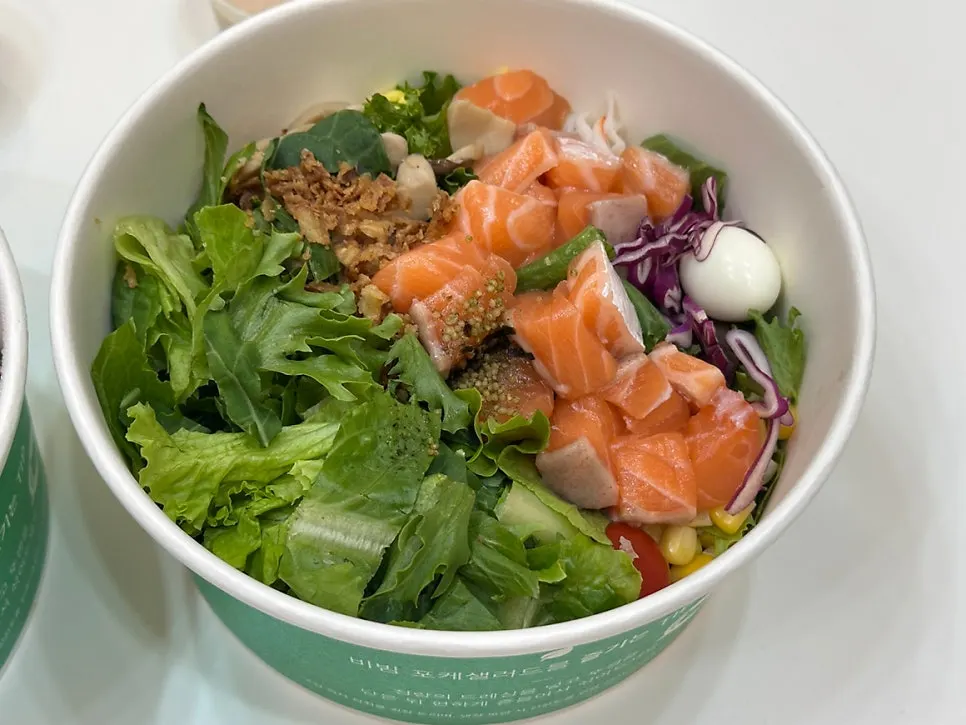 Bibim poke topped with diced raw salmon