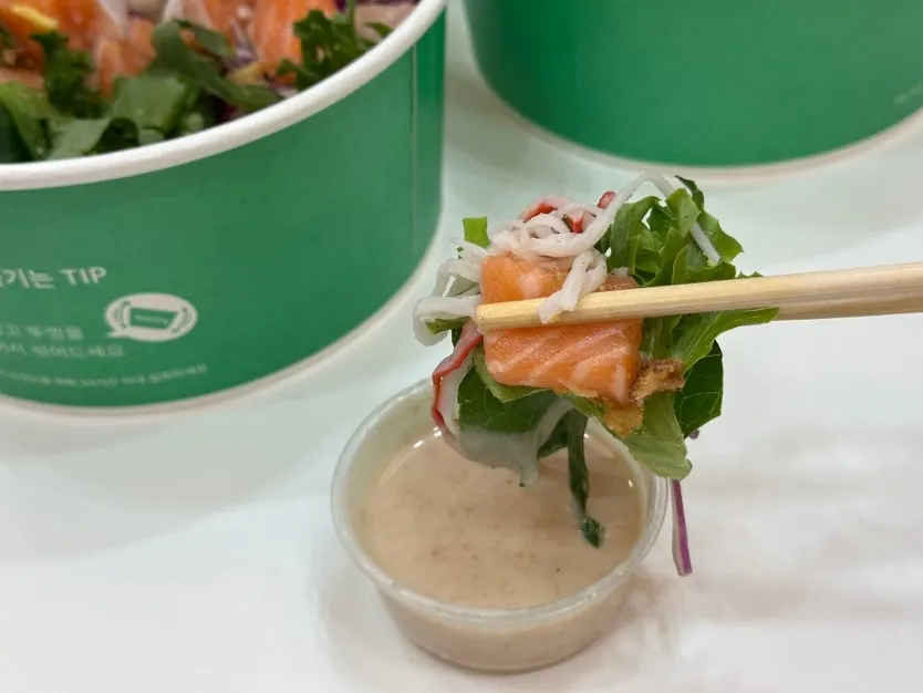 Salmon poke topped with mentaiko wasabi mayo sauce