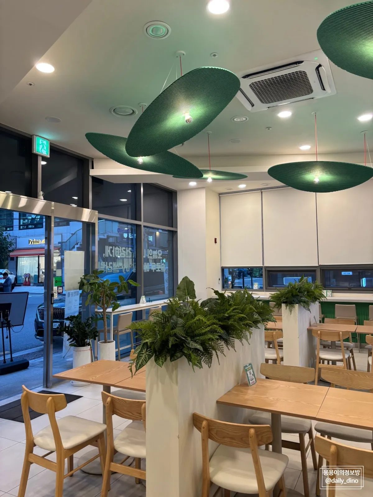 Interior of Salering Gyodae Direct Store with green accent interior