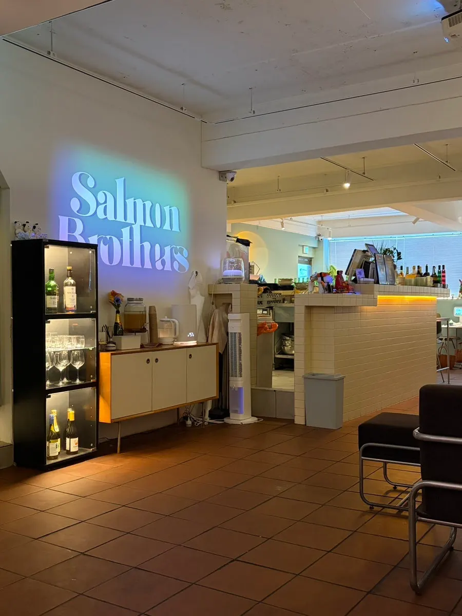 4-person table with sofa-style chairs at Salmon Brothers