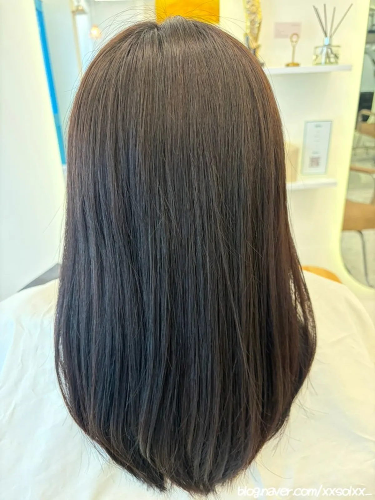 Finished look with hair evenly toned at level 6