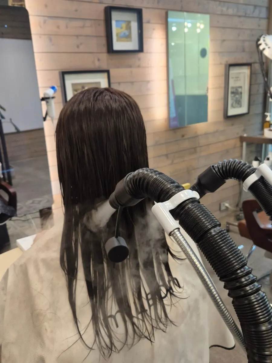 Applying product and starting the steam process after shampooing