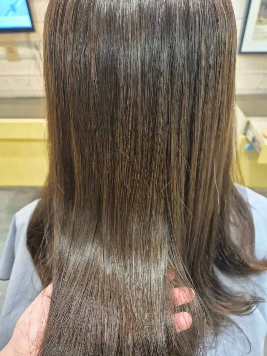 Silky long hair after the clinic treatment