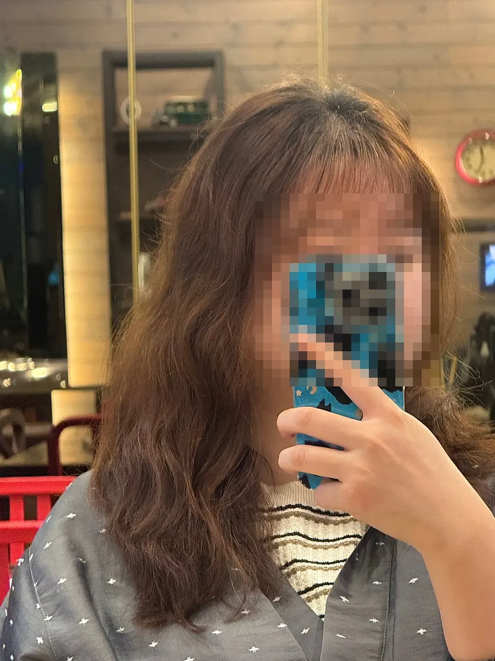 Cutting hair to a length just below the collarbone