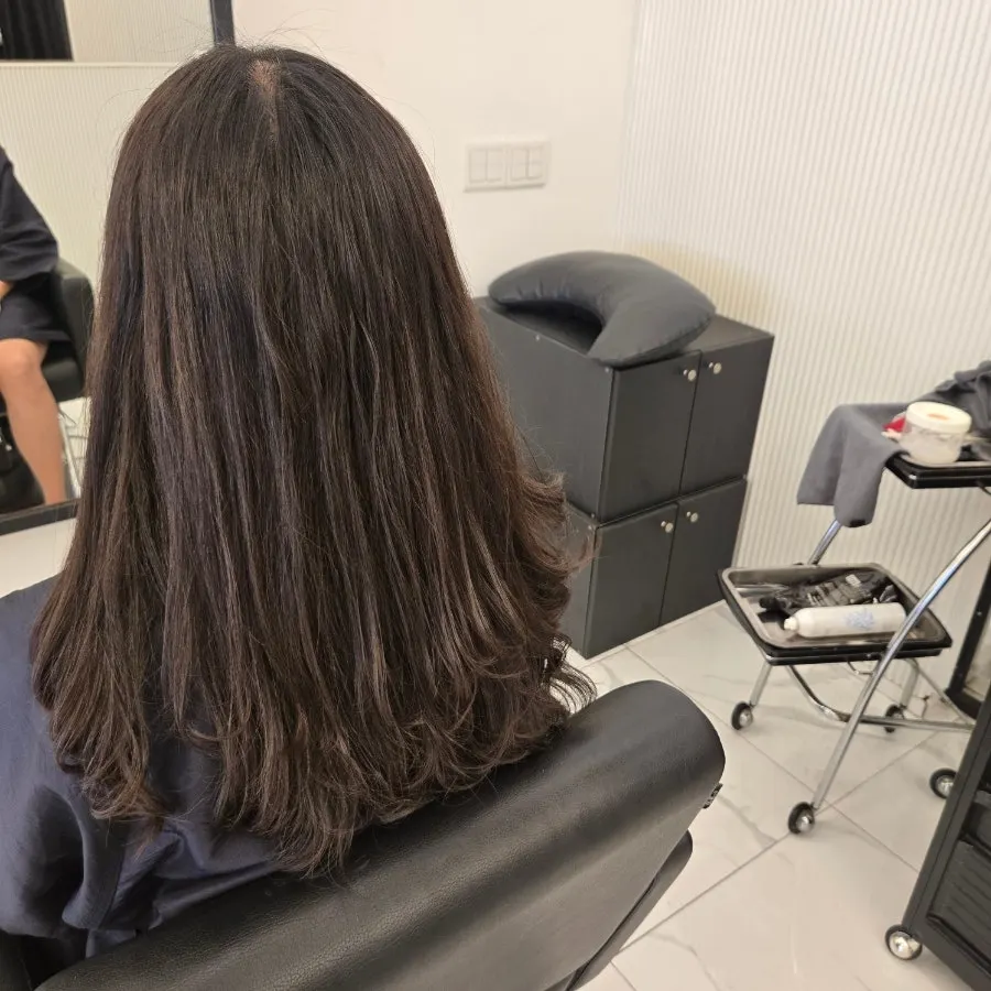 Calm-toned waiting area of the salon