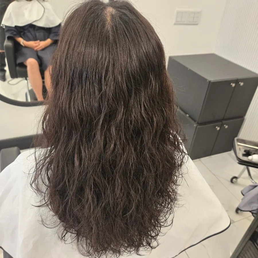 Side view of the finished perm style