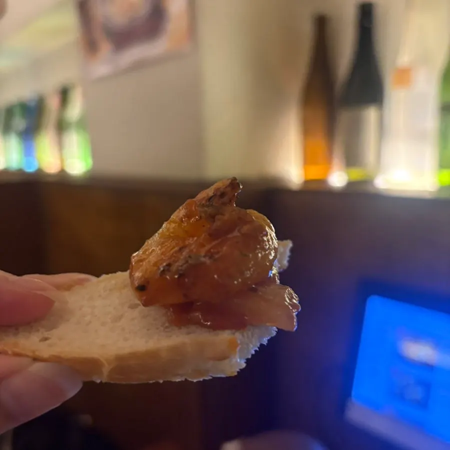 Baguette slices served alongside the nabe