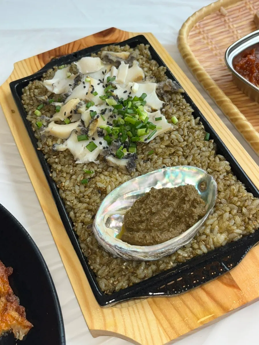 Two pieces of butter-grilled abalone