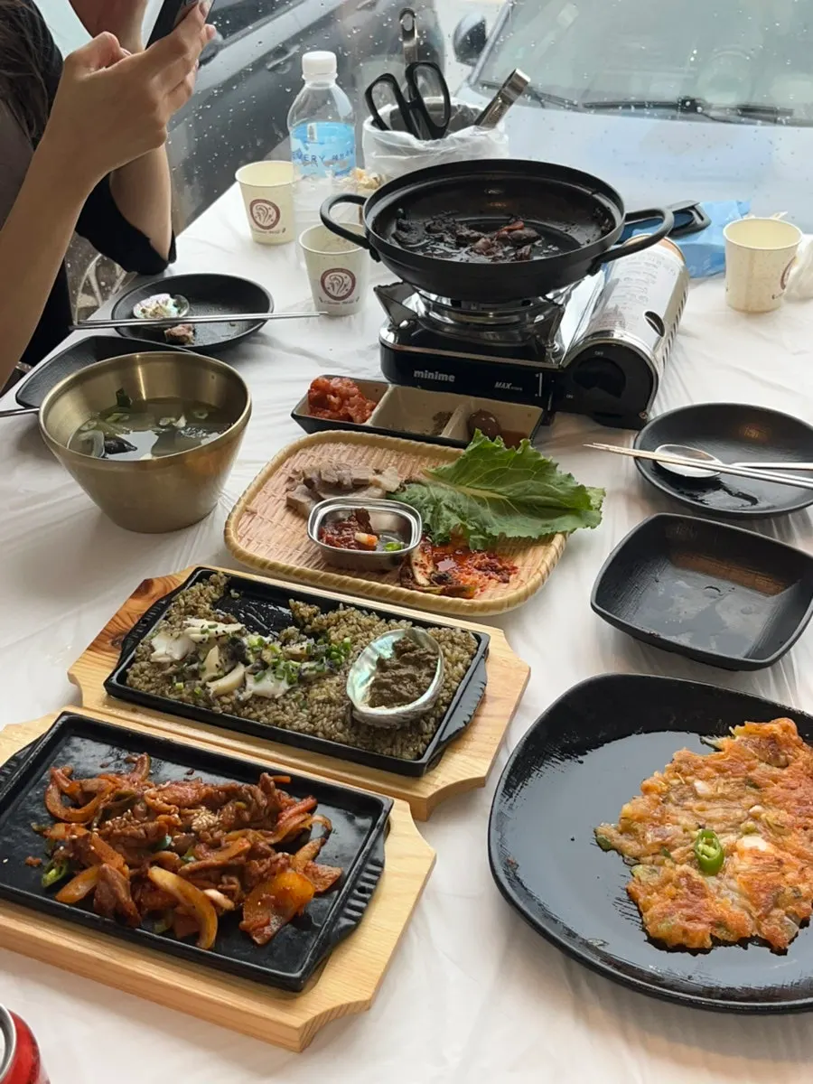 Plates of soy-marinated crab and shrimp