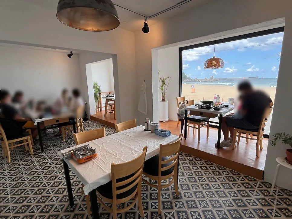 Table seating at Samcheok Bomulseom with an ocean view