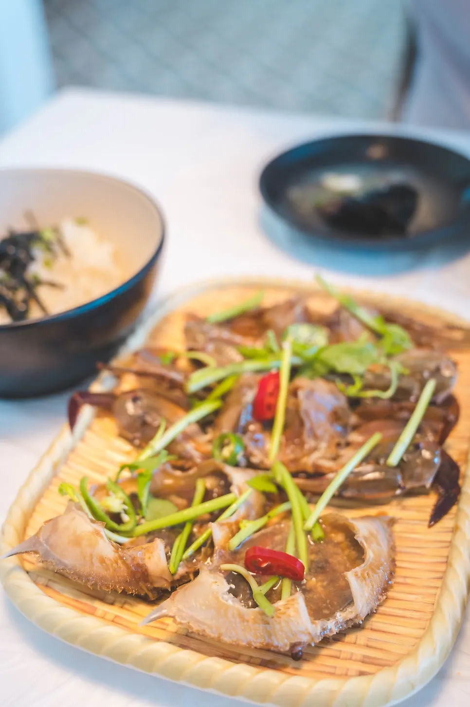 Two crabs served as soy sauce marinated crab (ganjang gejang)