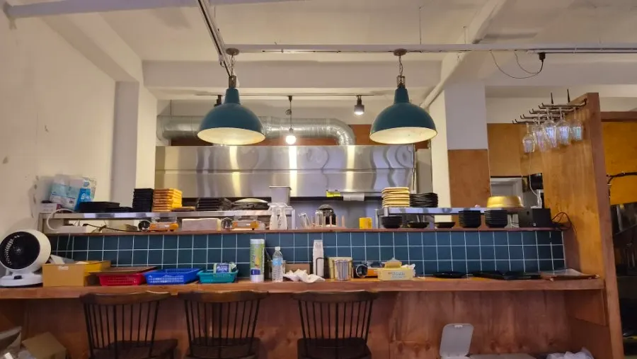 Omakase dishes being prepared on the kitchen table