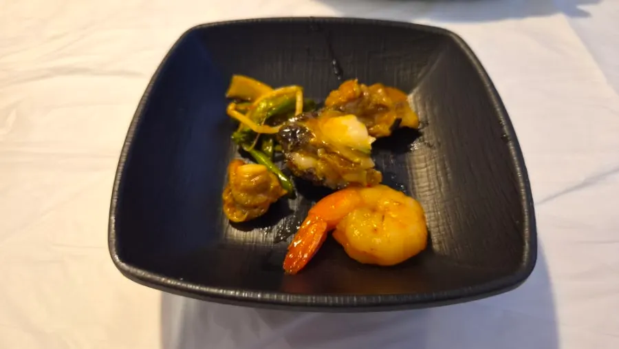 Ingredients from the seafood stew nicely plated