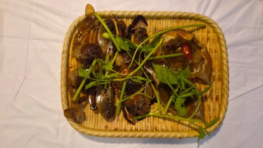 Soy-marinated crab sauce served as the second course