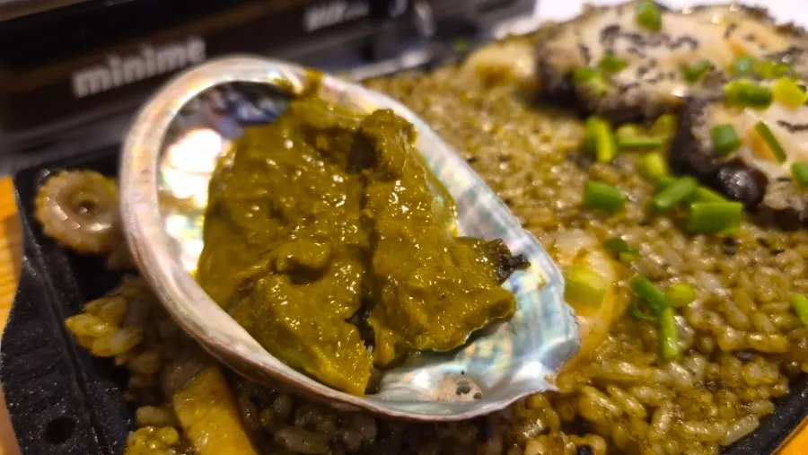 A spoonful of truffle abalone liver fried rice