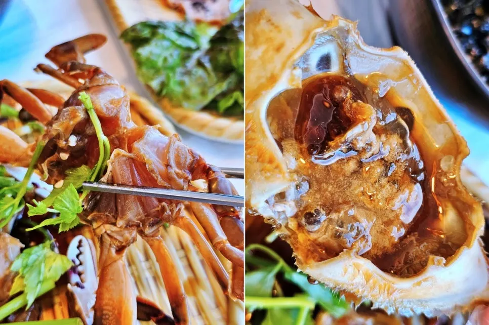 Soy sauce marinated crab topped with minari and chili