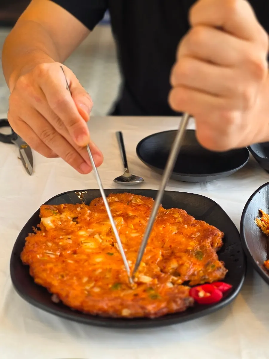 Crispy-outside, soft-inside kimchi jeon at Samcheok Bomulseom