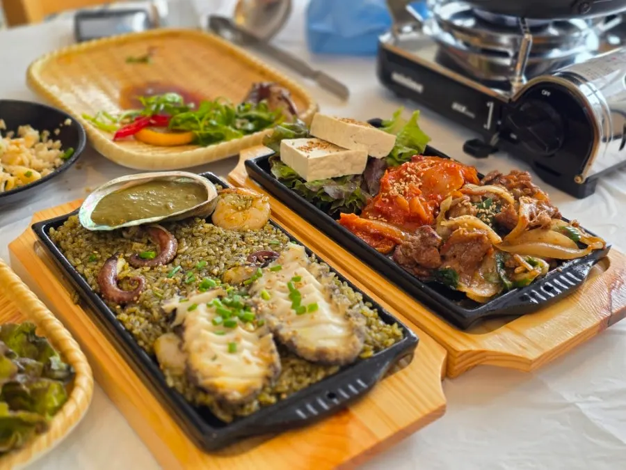 Abalone-innard seafood fried rice and tofu kimchi pork stir-fry