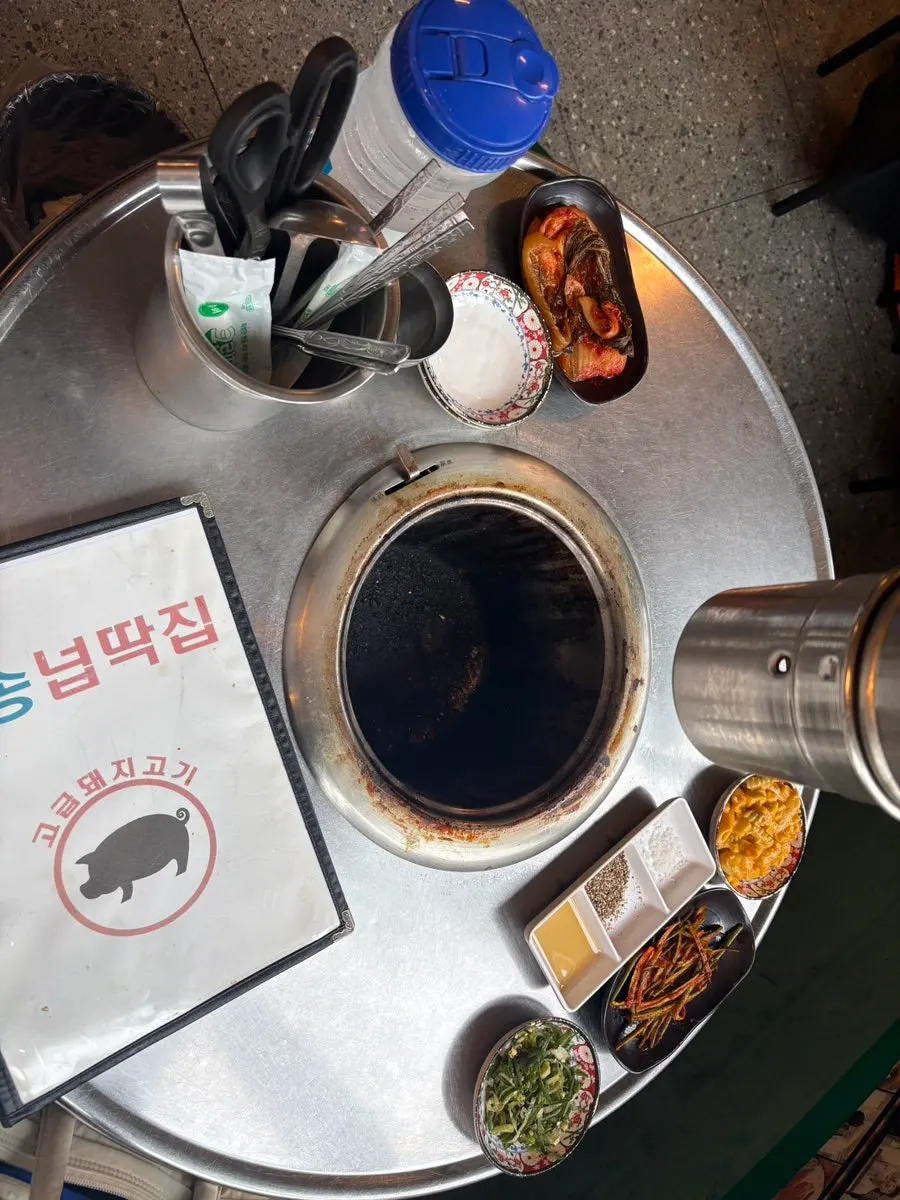 A variety of side dishes set out before ordering