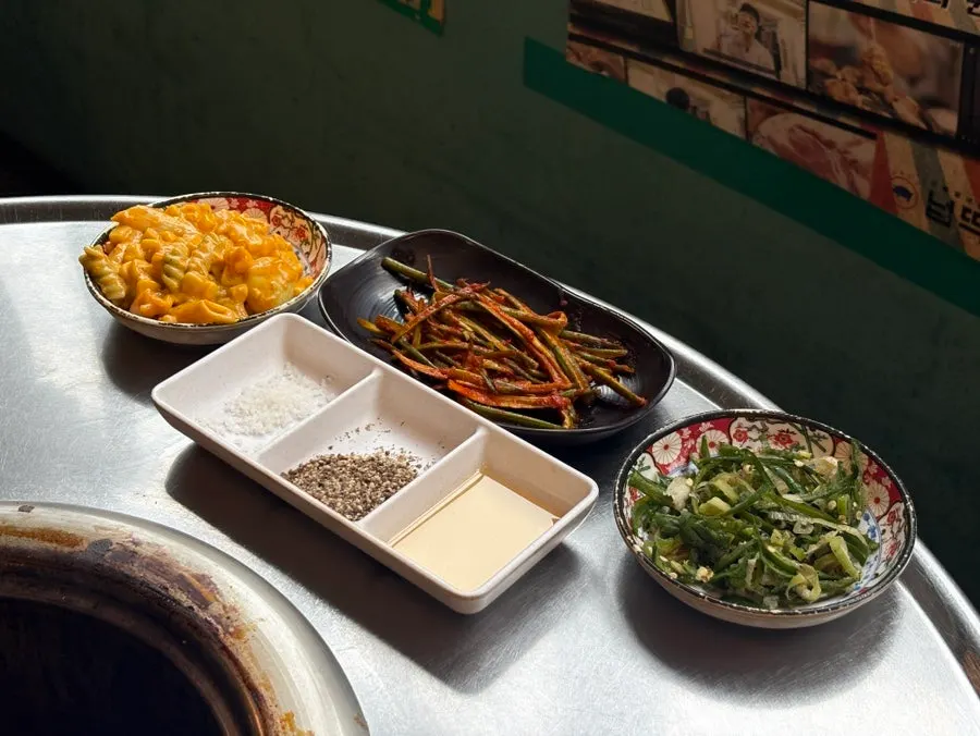 Aged kimchi and chili paejeolli among the side dishes