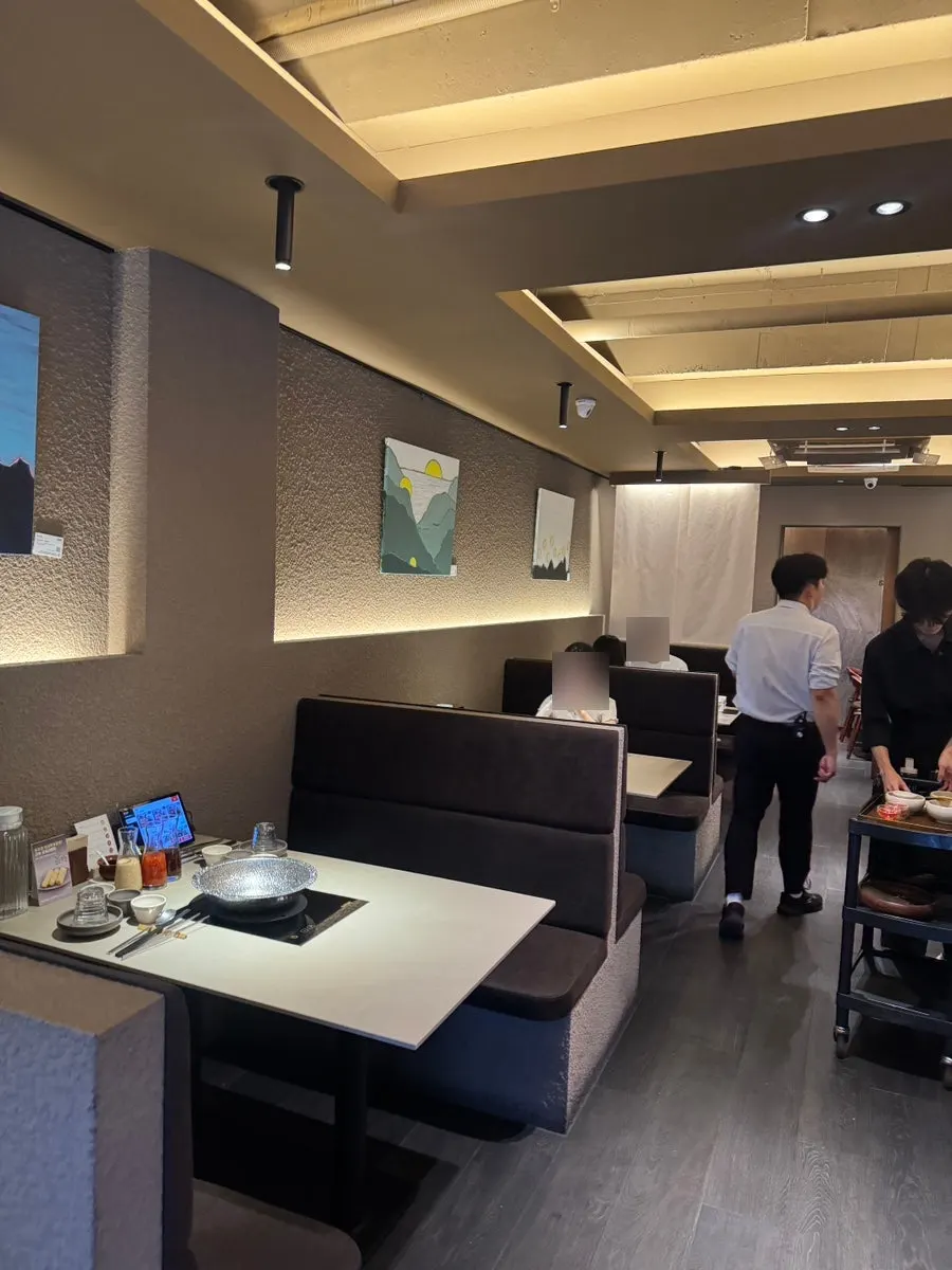 Interior of Shabu in Seoul with table partitions