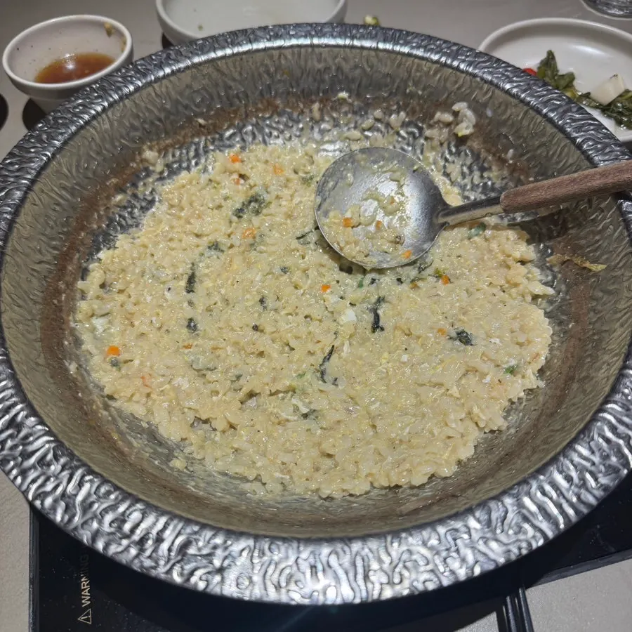 Egg juk with rice in rich broth