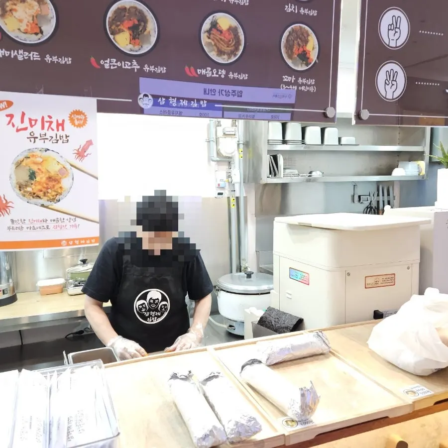 Gimbap being made to order in the shop
