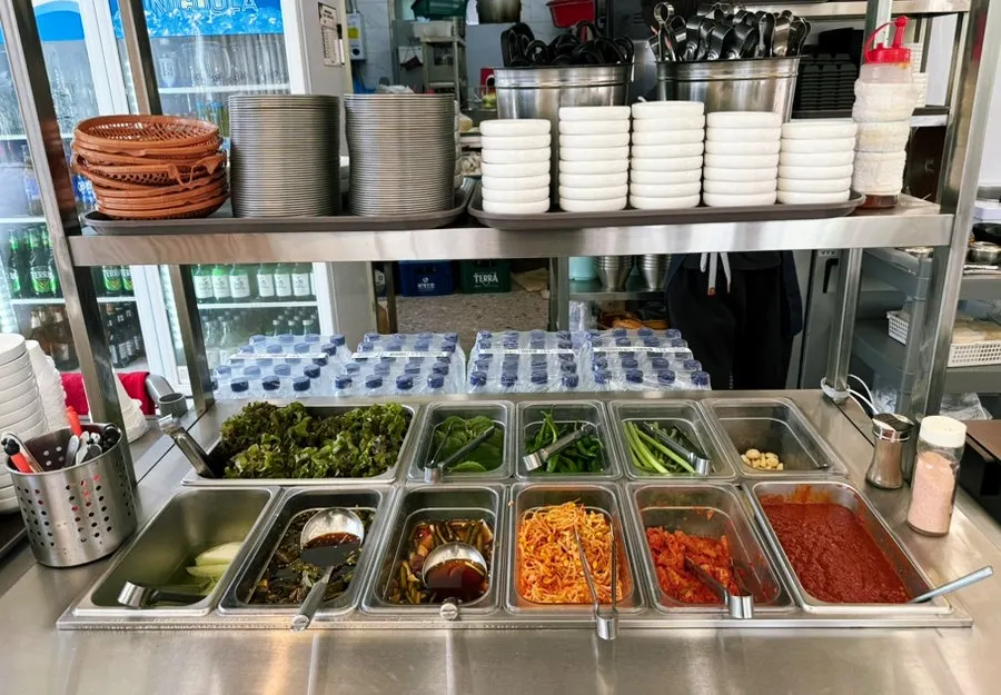 Extra side dishes taken from the self-serve bar
