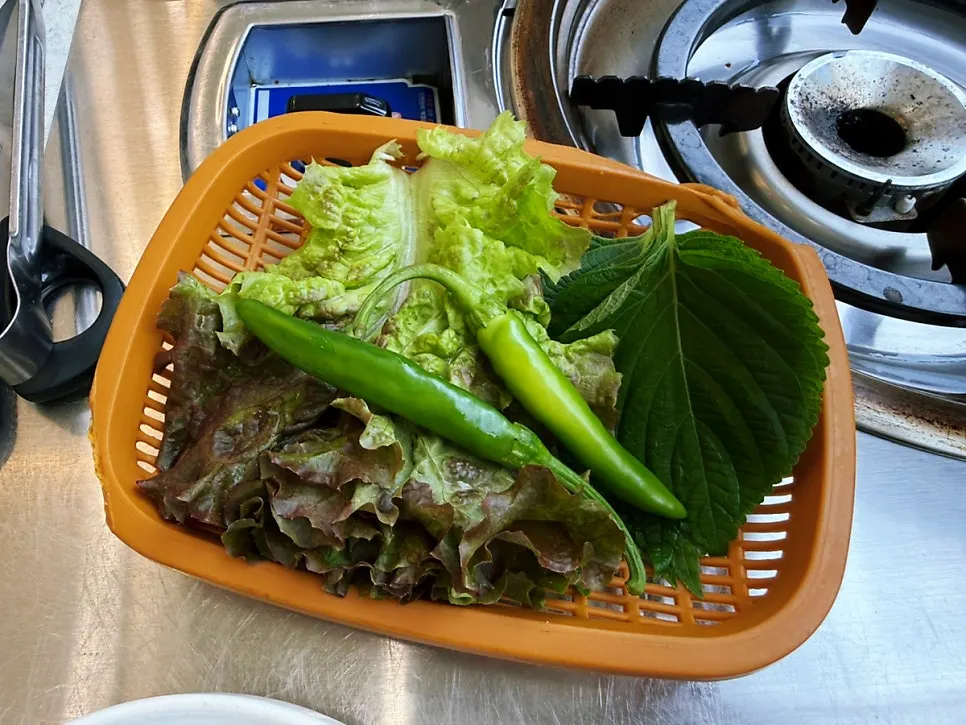Fresh lettuce wraps and scallions
