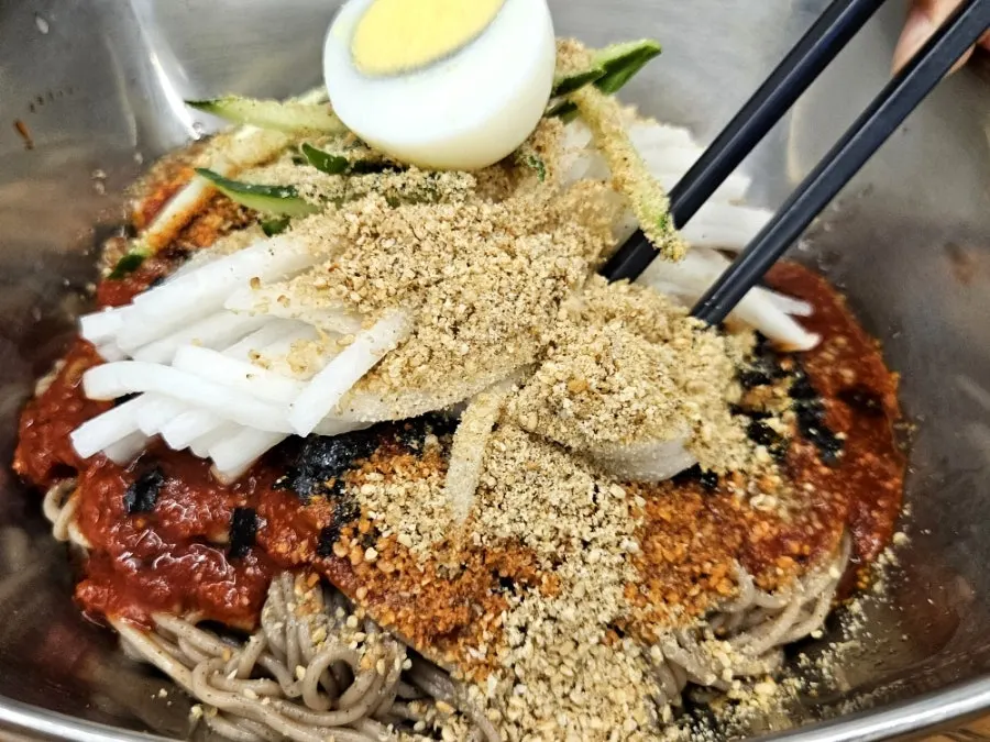 Extra-portion bibim makguksu noodles and toppings