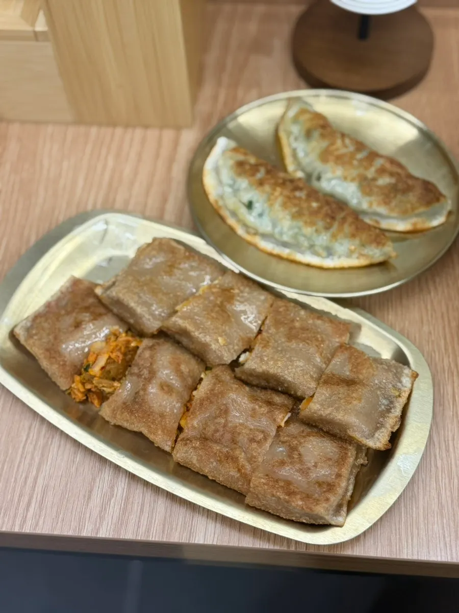 Plate with mandu and buckwheat pancake together