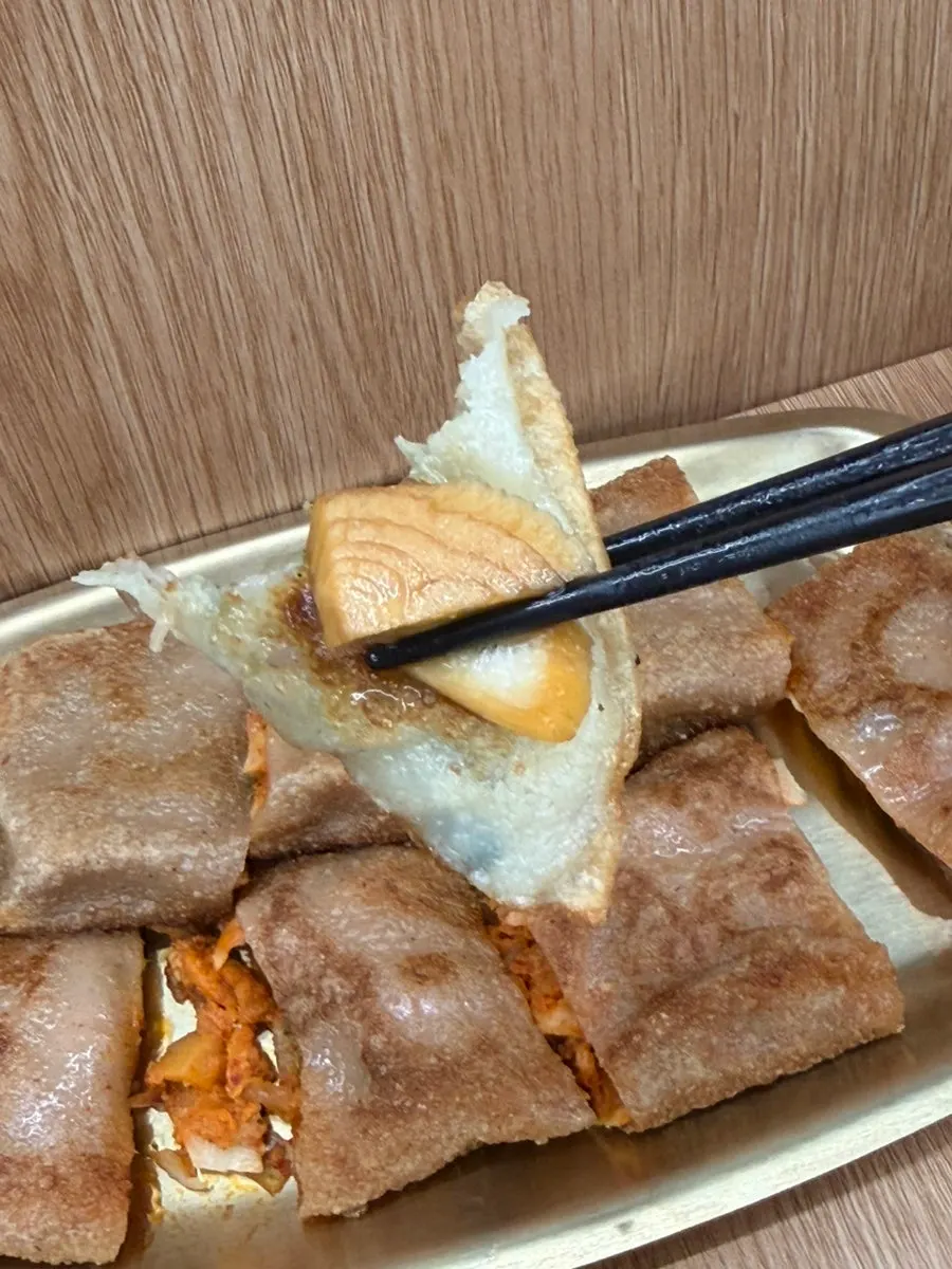 Juicy filling visible inside the mandu
