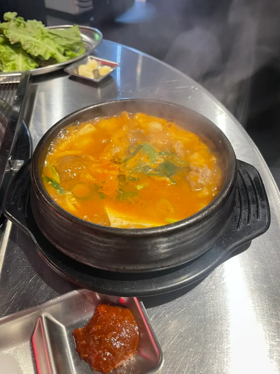 Puffed-up steamed egg in a stone pot