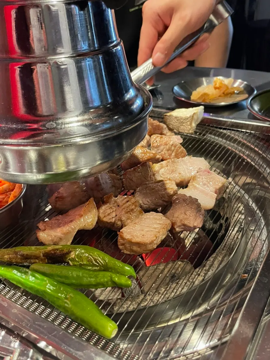 A well-browned piece of grilled pork neck