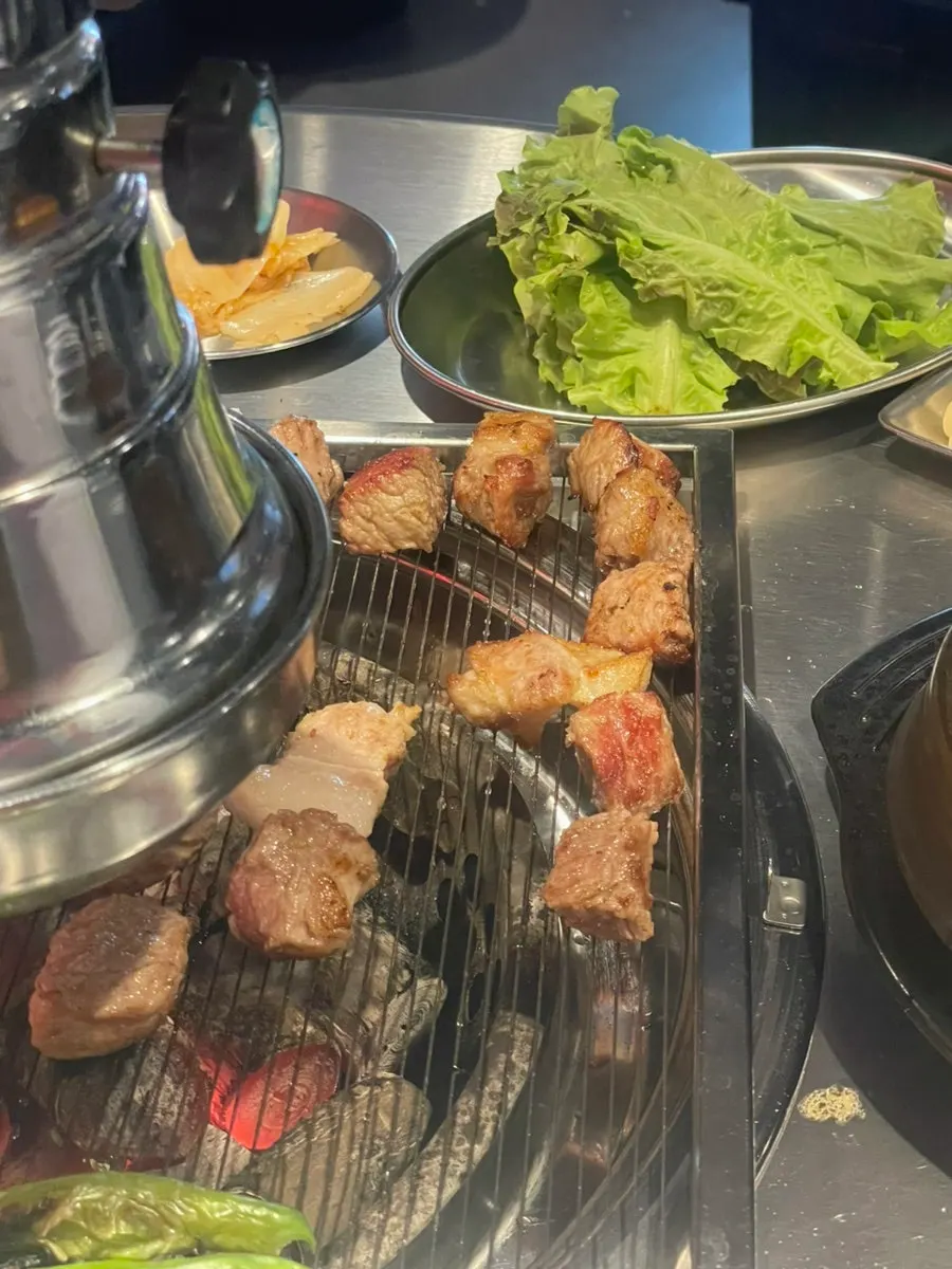 The grill and side dishes late in the meal at Sammokjip