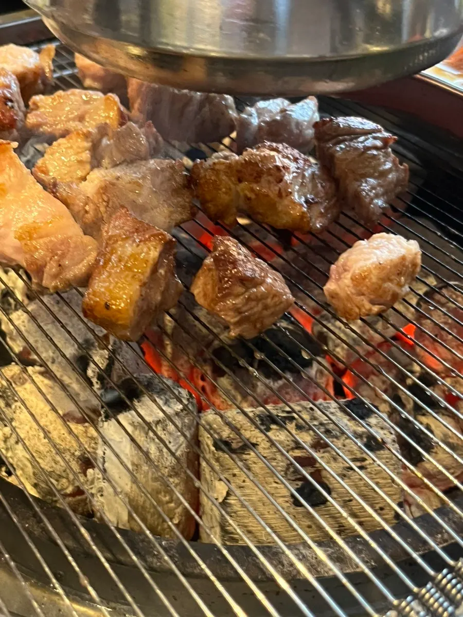 A piece of teukmoksal, golden outside and moist inside