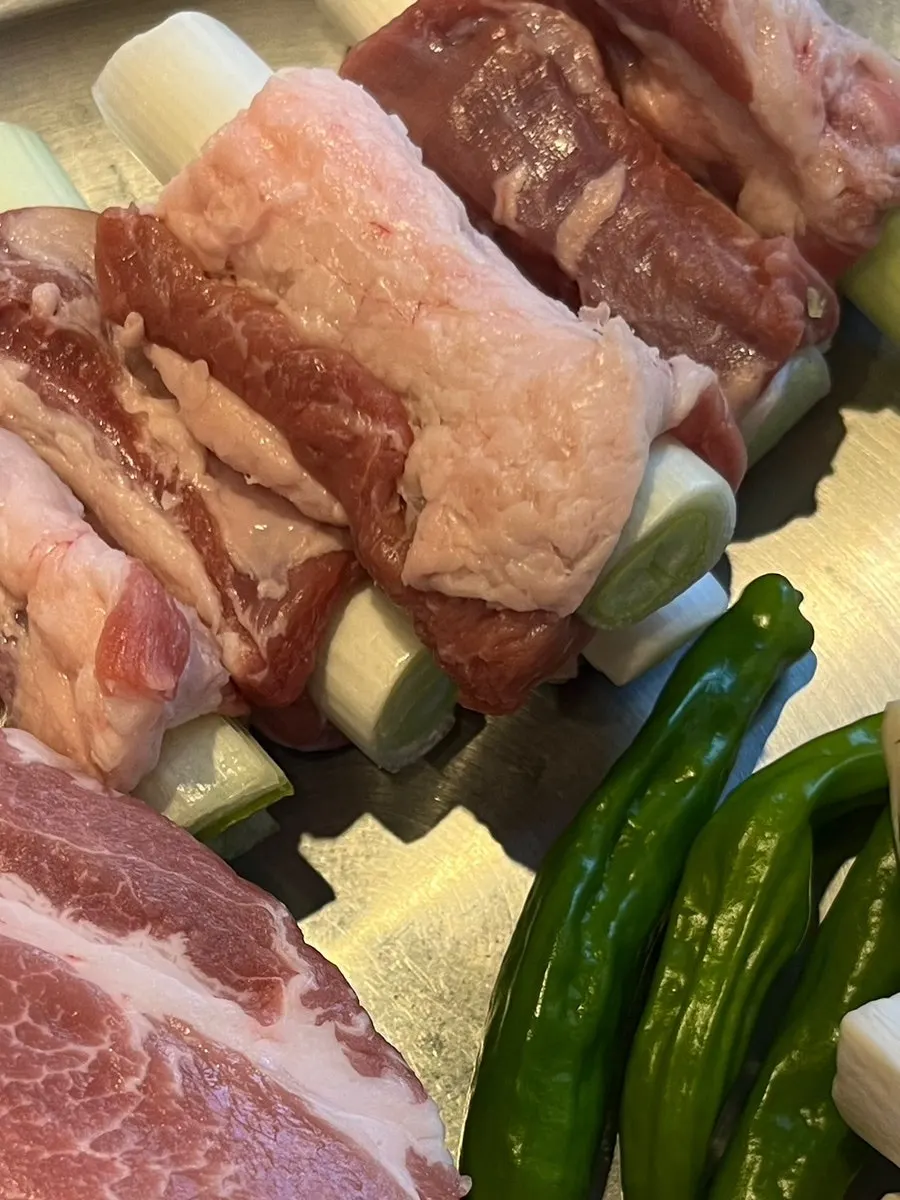 Galmaegisal with a whole scallion inside before grilling