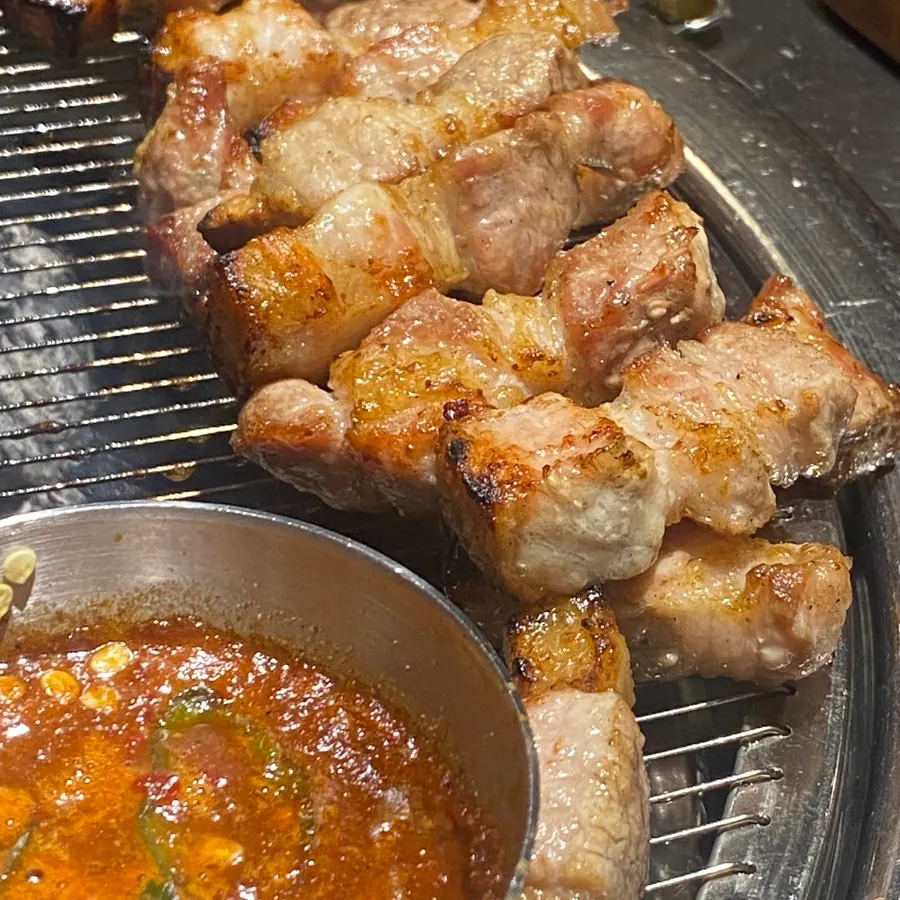 Pork belly and grilled kimchi on the grill