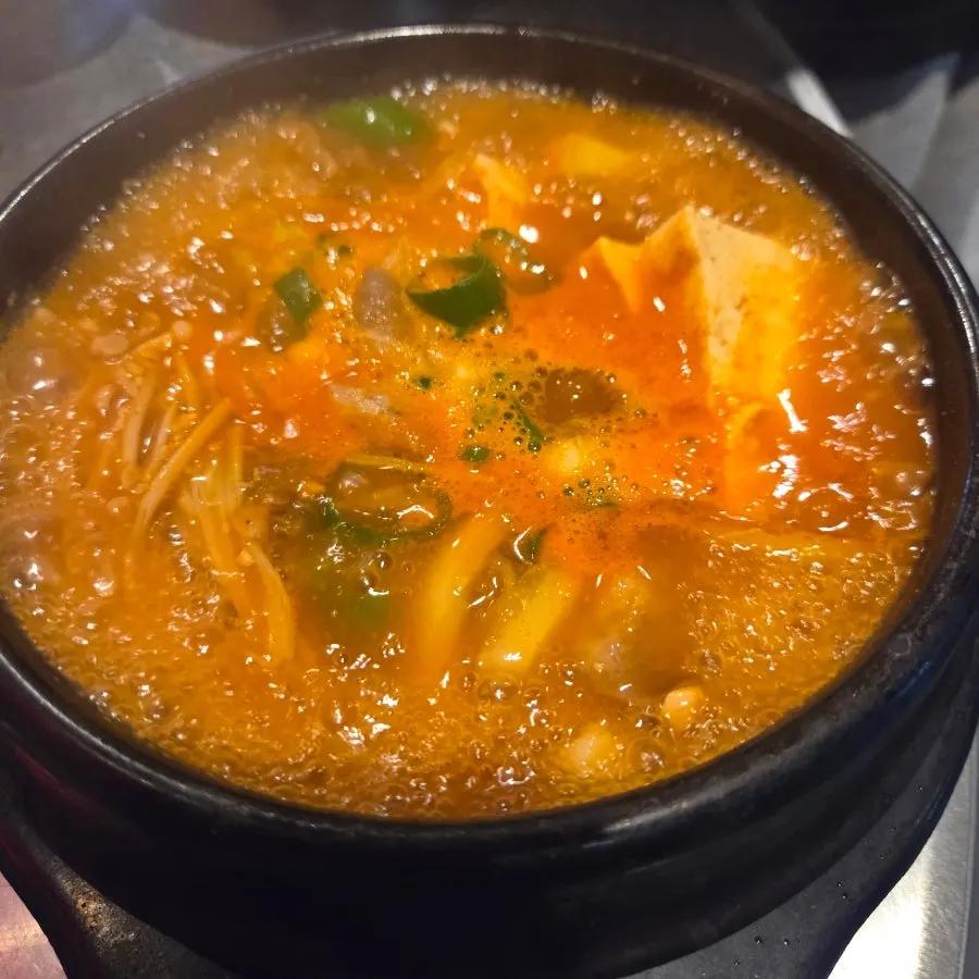 Chadol dwenjang jjigae with tofu and enoki mushrooms