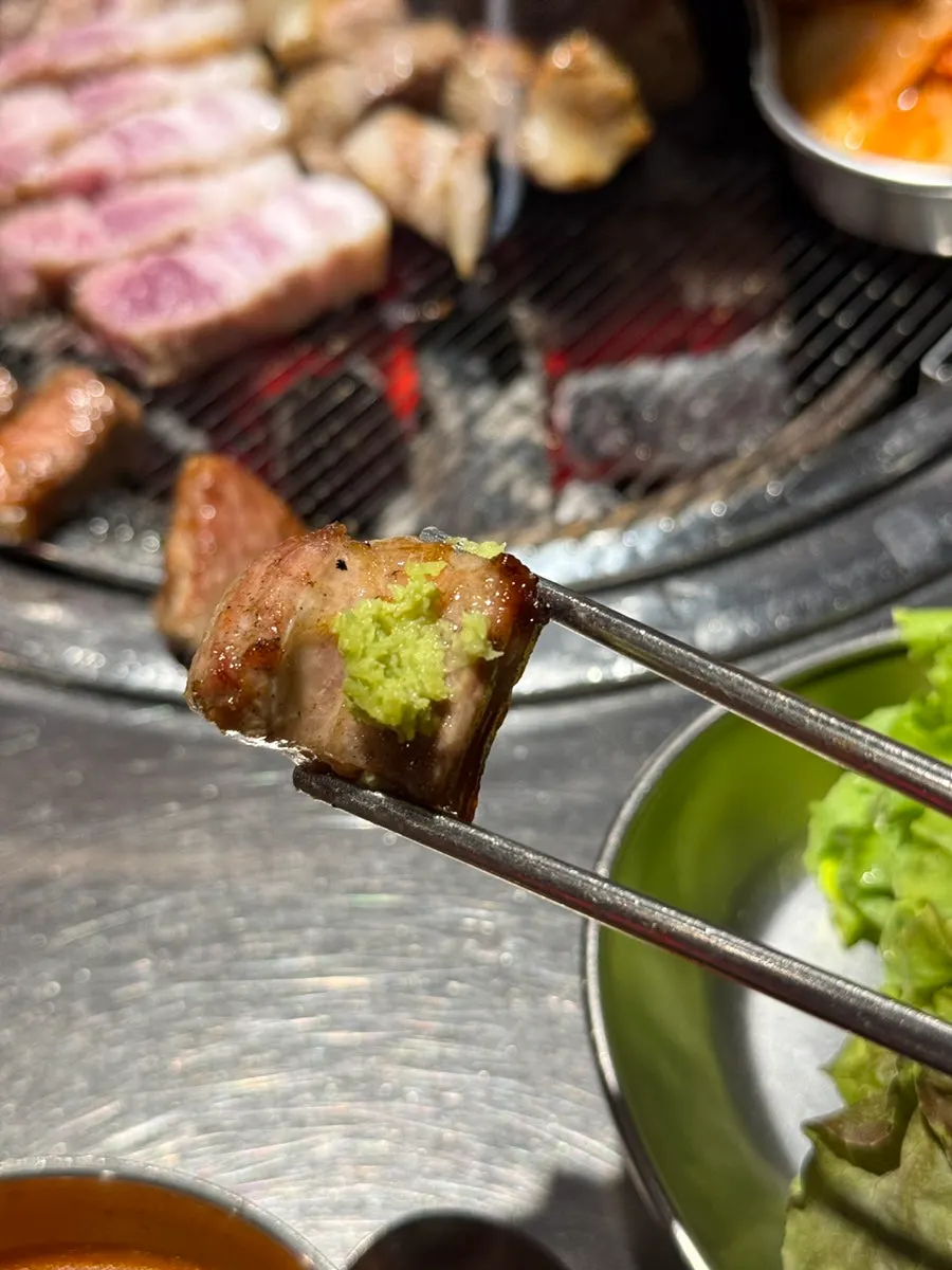 Pork belly cooking on the grill