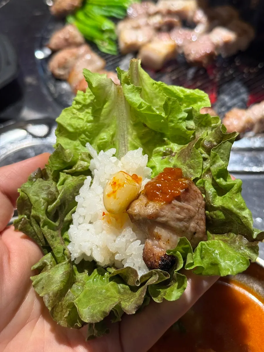 Meat paired with wasabi and myeong-i namul