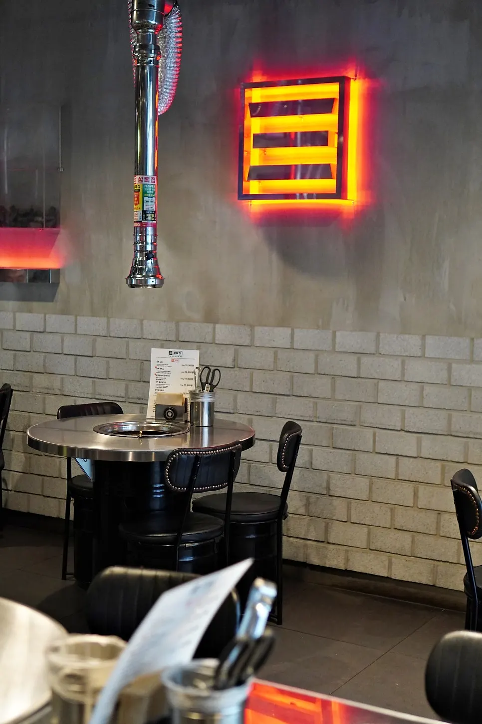 Seating and walkway inside Snug Roastery
