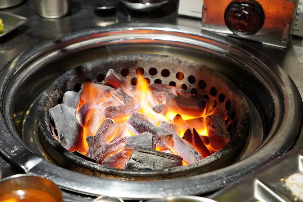 Charcoal grill set up at the table