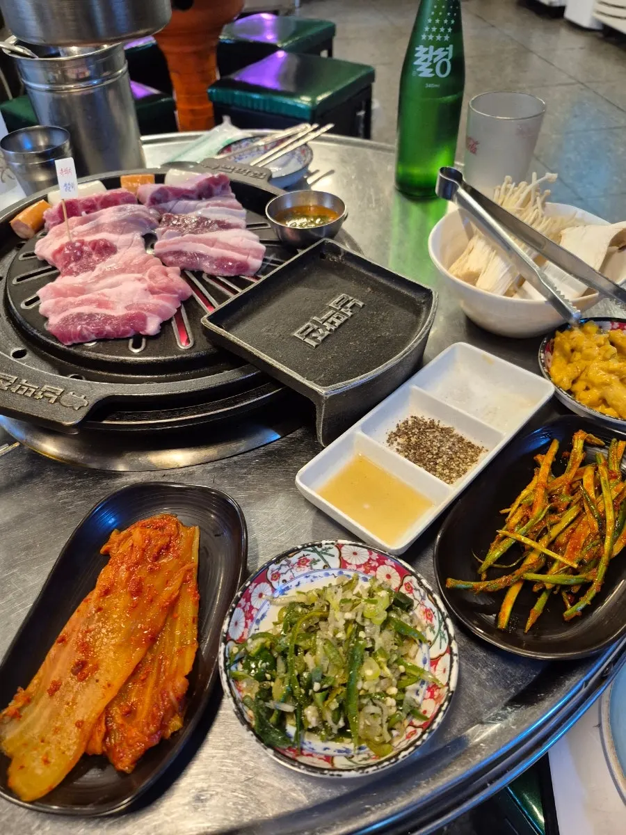 Thick-cut Sancheong black pork raw ribs served on a plate